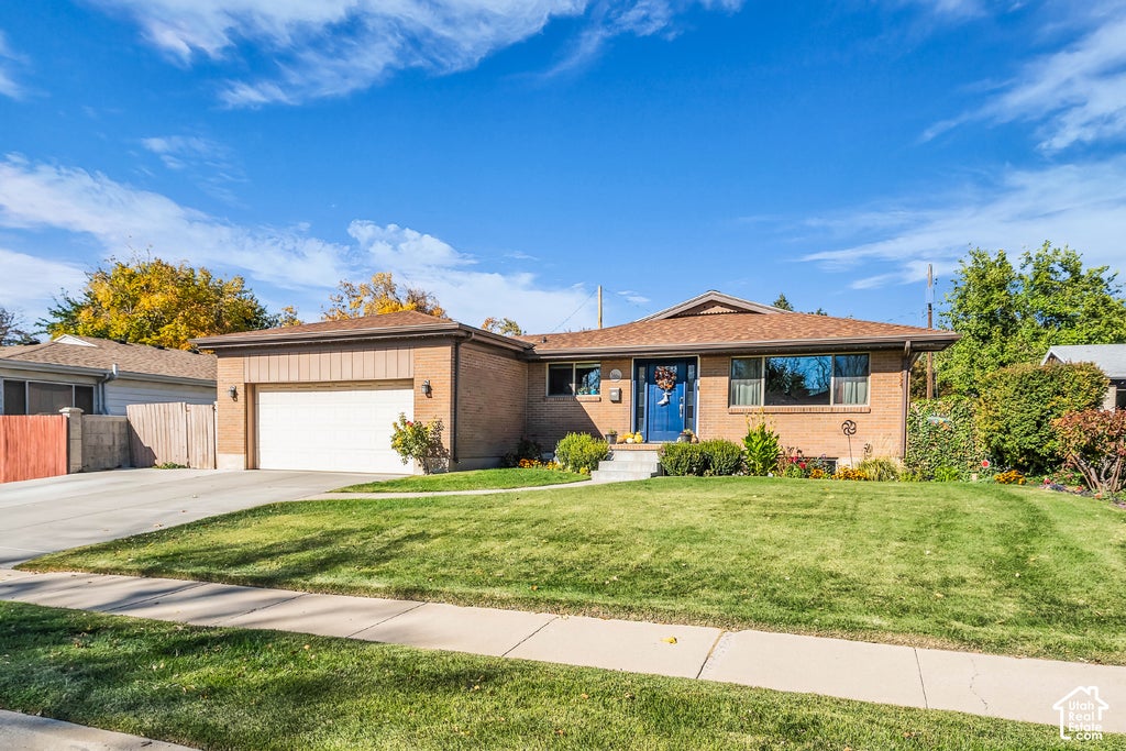 Photo of 1403 E LINDA ROSA AVE, Millcreek, UT 84106 (MLS # 2193383)
