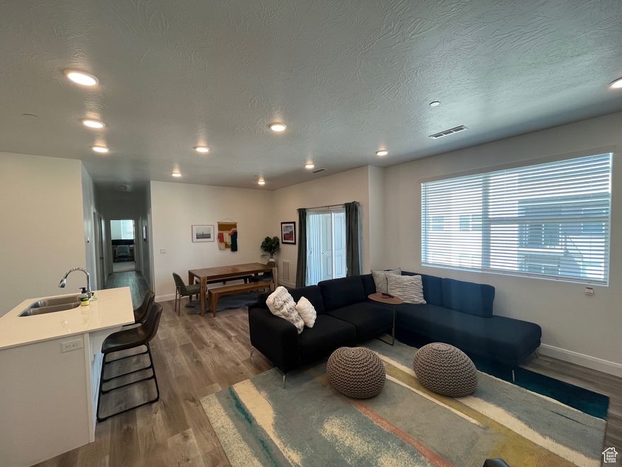 Residence of Desert Color experience a lifestyle like no other - with a stunning 2.5-acre lagoon for swimming, paddleboarding, and kayaking, plus pools, walking trails, and nearby shopping and dining. Whether you're looking for a full-time residence or a vacation getaway this condo offers the perfect bland of comfort and convenience in one of St. George's most desirable neighborhoods. Beautiful top floor condo with 3 bedrooms and 2 bathrooms, open concept floor plan and a garage. All information, figures, and documentation provided as a courtesy, buyer to verify all information.