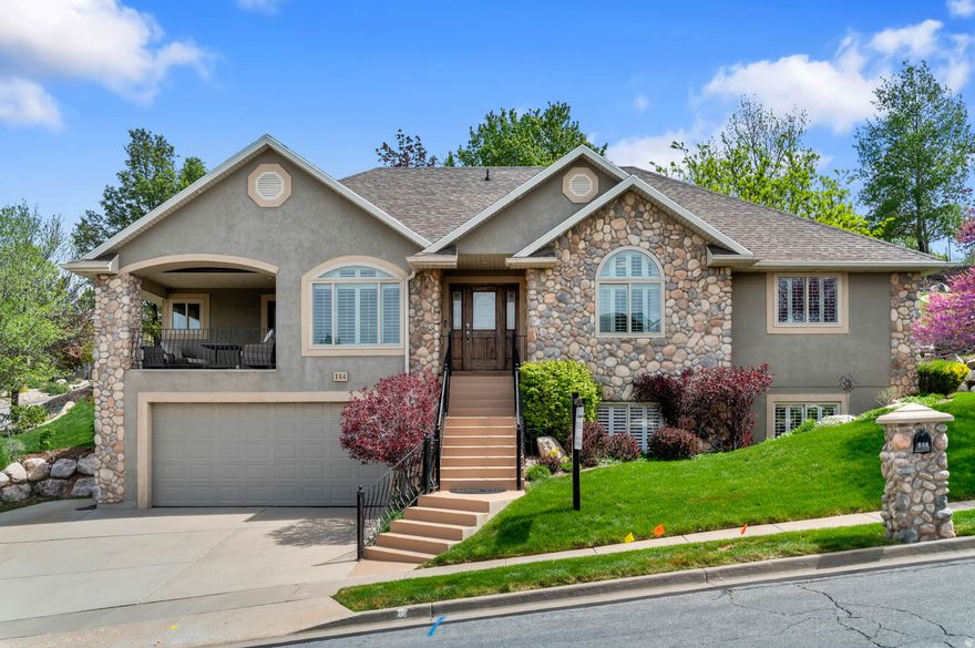 Set in a quiet neighborhood just 15 minutes from downtown and the airport, this well-maintained home offers everyday comfort, meaningful updates, and exceptional outdoor living. The main level features an open kitchen and living area, three bedrooms, two full bathrooms, and a spacious laundry room. Enjoy spectacular sunset views over Antelope Island from the front balcony, or relax on the back patio overlooking a private and peaceful backyard framed by mature trees.  The lower level adds excellent flexibility with a kitchenette, living area, spacious bedroom, full bathroom, and bonus space well suited for guests, hobbies, a home office, or multigenerational living. An oversized garage with room for up to four cars and abundant storage adds rare practicality, while major updates, including new windows in 2022, new flooring in 2024, and a new high-efficiency furnace and A/C in 2025, provide added comfort and peace of mind. View the 3D tour here: https://my.matterport.com/show/?m=y4jkdZdRjby