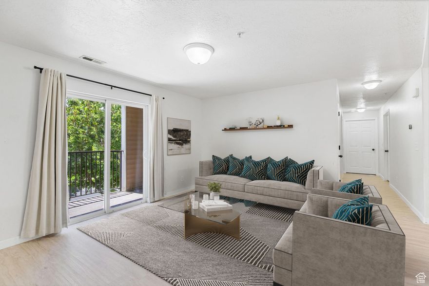 $10,000 PRICE REDUCTION!!!  SELLER IS OFFERING $2,700 TOWARD CLOSING COSTS when you use our preferred lender ***.***   Beautiful and Spacious Condo with 3 Bedrooms, 2 Bathrooms, and plenty of NEW UPDATES!!  This unit has MORE UPDATES and has been BETTER MAINTAINED than most in the complex!  Enjoy BRAND NEW FLOORING, plus a REMODELED BATHROOM and LAUNDRY ROOM.  You'll love the OPEN FLOOR PLAN, large KITCHEN & DINING AREA, and the PRIVATE BALCONY with a storage room.  The Primary Bedroom is spacious, complete with an Ensuite Bathroom and a huge Walk-in-closet.    The community offers a Gym, Pool, Clubhouse, Playground, and Covered Parking - everything you need for an active and enjoyable lifestyle!     Conveniently located just minutes from Parks, Shopping, Restaurants, and Entertainment, this is the home you've been looking for - come see it today!  Information and measurements are estimated and provided as a courtesy; buyers are advised to take their own measurements and verify all information.