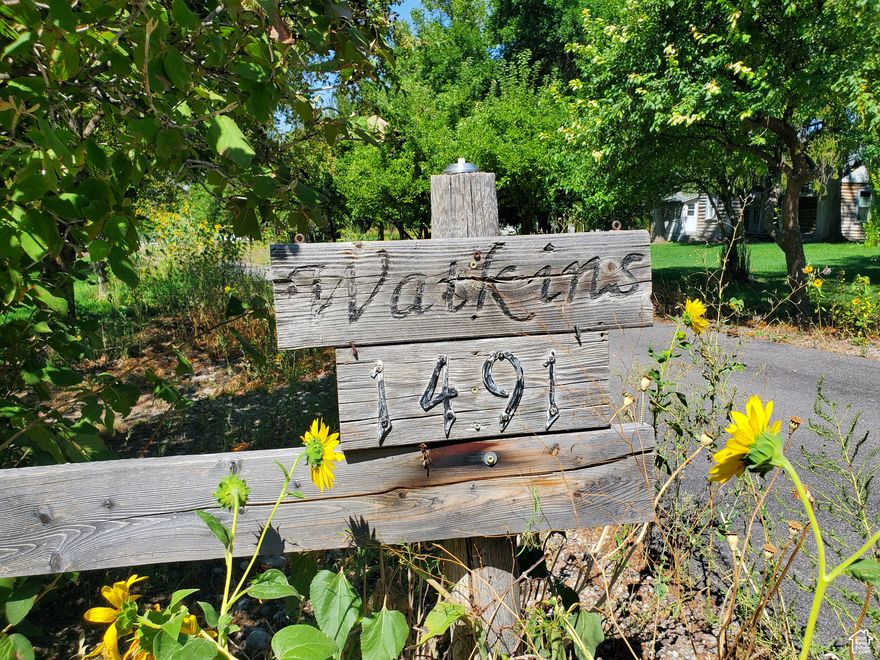 Enjoy custom country living only minutes from USU and downtown Logan! As you enter this private and secluded drive, you'll see the historic cabin off to the right, which was built in 1894 and was all part of the original homestead, including the 160 acres that have been passed down through 5 generations of the Crookston Family. This main home on 2.746 acres was built in 2001 and embodies the legacy and love for this amazing property! As you enter the home, you'll be drawn to the French doors, which open to the great room offering spectacular views through a row of large, picturesque windows. You'll love gazing at the mountains or simply watching the wildlife that is drawn to this secluded and mature landscape, including your very own pond. This special room also includes hardwood floors, custom built-ins, a cozy gas fireplace, and leaded glass doors, making it a perfect refuge for relaxation as well as the favored gathering place amongst family and friends! The Chef's kitchen is very functional with tons of counter space, maple cabinets, a central island with a stainless steel top, quarts countertops, double ovens, a gas range, an office workstation, and many other features that you'll want to come see! The main floor also includes the primary bedroom with private access to the extensive deck, a separate tub-shower, and a large walk-in closet. There is also an en-suite on the main floor that has a separate entrance off the front porch and full bathroom. The lower level includes another bedroom/bathroom with a large family/game room, as well as art studio and workshop areas. You'll have the option of purchasing the cabin, as well as the 7.535 Acres of additional land available just to the north of this home, beyond the pond. The potential to acquire the cabin (MLS 2108742) and this additional land could be a tremendous investment opportunity, as the cabin could be turned into a rental, and the additional acreage includes approval to add 6 1-acre buildable custom lots!  You may also wish to simply maintain this open space as a working farm for agricultural, livestock, or horses.  Please call or text for more information. A parcel map has been included within the documents tab, which will clarify the boundary lines for all three properties. Note: the 7.535 acres is not yet listed, so please call the listing agent for details.