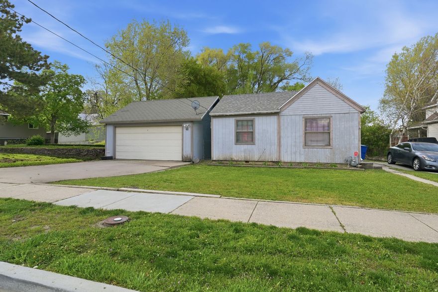Investor Special! This 2-bedroom, 1 bath home at 259 14th St in Ogden offers a great opportunity for investors or buyers looking to own a home with great potential. Located in a quiet, established neighborhood and only 3 minutes to downtown Ogden and 11 minutes to Weber State University.  The home features a vaulted ceiling in the kitchen with charming wood paneling, and a detached 2 car garage.  There is hardwood flooring in one of the bedrooms.  The home includes a washer and dryer for added convenience.  Property is being sold AS-IS.  Ideal for renovation, rental potential, or a fix-and-flip project. Bring your vision and make this home your own!