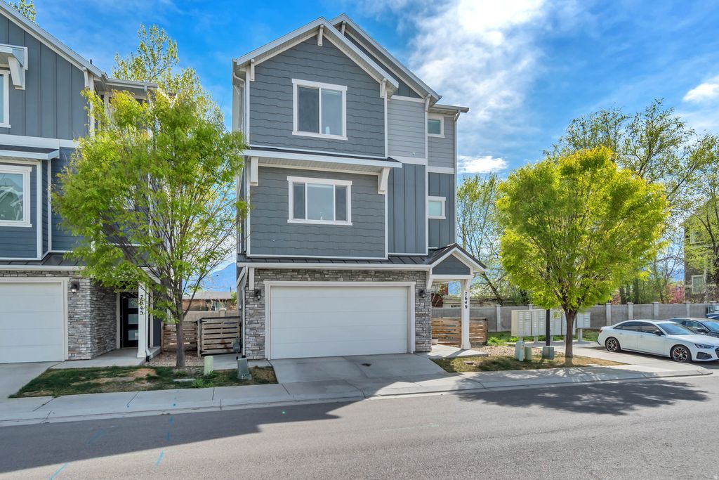 Photo of 7649 S LIND LN, Midvale, UT 84047 (MLS # 2147100)
