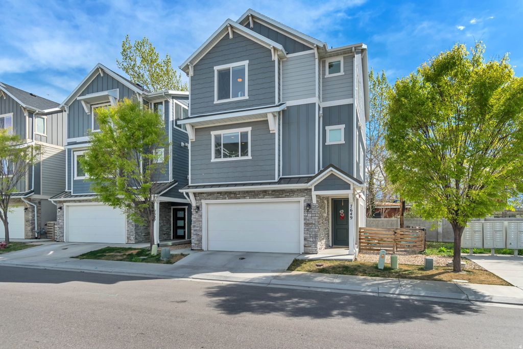 Photo of 7649 S LIND LN, Midvale, UT 84047 (MLS # 2147100)