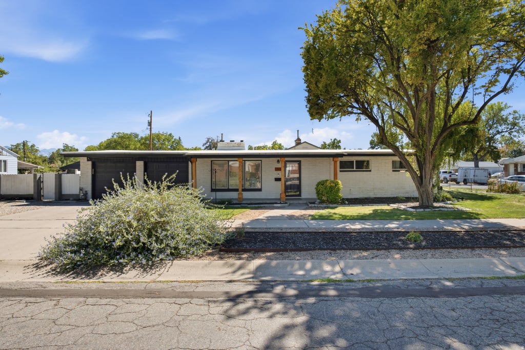 Photo of 1093 W MACFARLAND DR N, Salt Lake City, UT 84116 (MLS # 2184612)