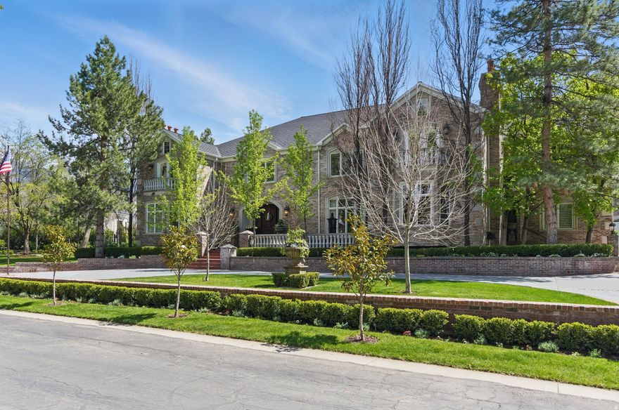 Don't miss this one-of-a-kind chance to own a top home in the gated Roselan community in beautiful, tree-filled Holladay. It's like living in your own private park, with easy access to everything, quick commutes, and total privacy. This custom-built estate has a huge, smart layout with high-end details and expert craftsmanship everywhere. The chef's kitchen shines with Thermador, Miele, and Sub-Zero stainless-steel appliances, granite counters, and custom cabinets. Tall, vaulted ceilings and tons of natural light make it feel open and bright. On the main floor: two home offices, a luxurious primary bedroom with its own deck and hot tub, a spa-like bathroom, and a massive walk-in closet with laundry. Great for parties-a 24-seat theater with a fun 1950s diner vibe, full gym, craft room, and a separate 2-bedroom apartment above the garage with its own kitchen, bath, and entrance. Outside: a big, covered patio with fireplace flows right from the family room for easy indoor-outdoor living. Enjoy a full outdoor kitchen, large pool with diving board, stone hot tub, and plenty of yard space. The heated 6-car garage has epoxy floors and water hookups. Downstairs: a full indoor spa with sauna and steam room, plus a wet bar/dance area, huge dry storage, and food storage rooms. Close to Cottonwood Canyons for world-class skiing and hiking, and just minutes from shopping, restaurants, and excellent schools. This is true luxury in one of Holladay's most desirable neighborhoods.