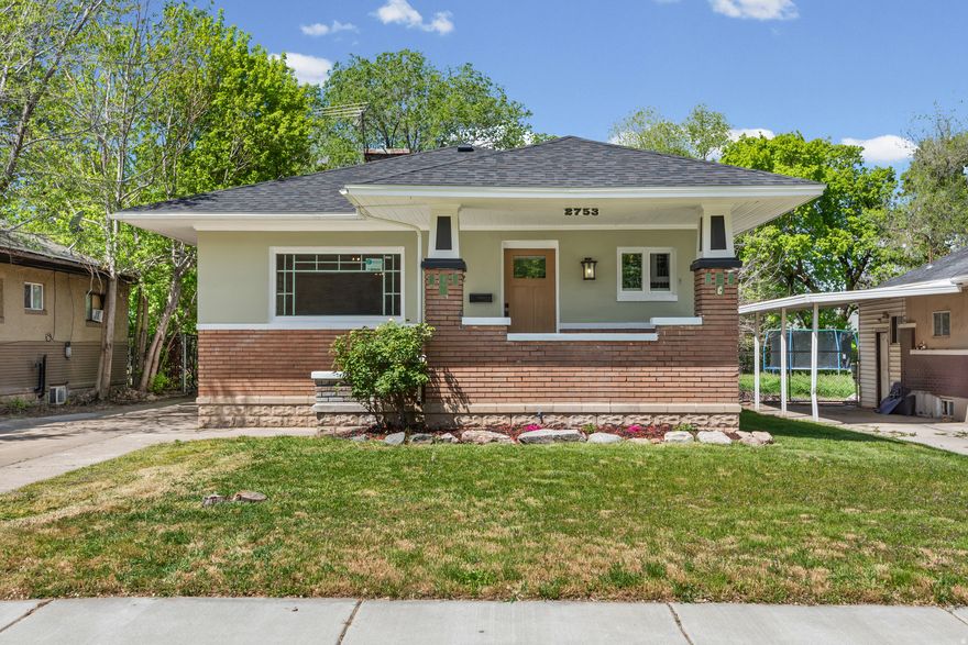 Renovated charm meets modern comfort on a quiet Ogden street. This beautifully updated bungalow blends timeless character with thoughtful upgrades throughout. Step inside to discover a brand-new kitchen featuring updated appliances, complemented by slate flooring and gorgeous refinished hardwood floors that carry warmth and style through the home. Original woodwork around the windows adds a touch of historic elegance, while stained glass accents in the primary closet create a truly unique and memorable detail.  The main level offers a brand-new full bathroom and a convenient stackable washer and dryer closet, designed for easy everyday living. Major system updates provide peace of mind, including new windows, doors, HVAC system, and central air.  Downstairs, the fully finished basement expands your living space with two generously sized bedrooms and an impressive 3/4 bathroom with designer finishes that truly stand out.  Outside, enjoy a spacious backyard ready for gatherings, play, or quiet evenings under the open sky. Mature landscaping and a fully fenced lot add both beauty and privacy.  This is the perfect blend of classic craftsmanship and modern updates, all in a peaceful setting you'll love coming home to.   Square footage figures are provided as a courtesy estimate only and were obtained from county records.  Buyer is advised to obtain an independent measurement.