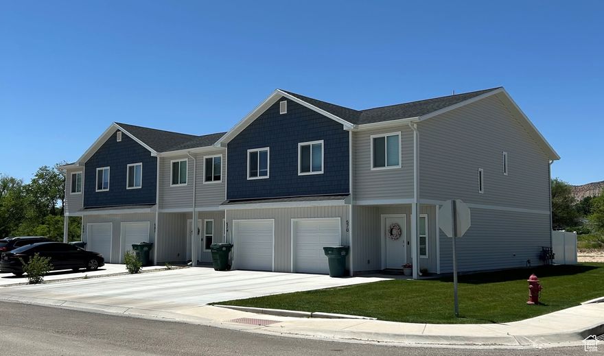 Step into the comfort of a brand-new home--fresh, modern, and never lived in. This beautifully crafted Everbuilt townhome is truly move-in ready, blending style, function, and value.  Inside, you'll find a bright open layout with designer finishes throughout:  Quartz countertops and white shaker cabinets for timeless elegance. Stainless steel appliances included. Luxury vinyl plank flooring for durability and easy care. Soft, high-performance carpet to keep bedrooms cozy.  Practicality meets convenience with a 1-car garage plus extra storage space-perfect for gear, tools, or seasonal items.  Tucked away in a private and peaceful setting, yet only minutes from shopping, dining, and downtown Vernal, this location offers the best of both worlds. Whether you're a first-time buyer, looking to downsize, or seeking a solid investment property, these townhomes deliver on quality and affordability.  Additional units are under construction and scheduled for completion in October 2025-secure yours now before they're gone!  Square footage figures are provided as a courtesy estimate only. Buyer to verify all. This listing is for middle units.