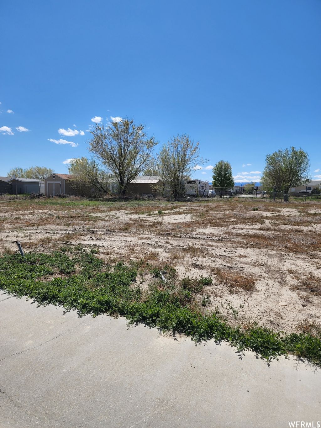 Photo of 230 MAPLE ST #27, Wellington, UT 84542 (MLS # 2132647)