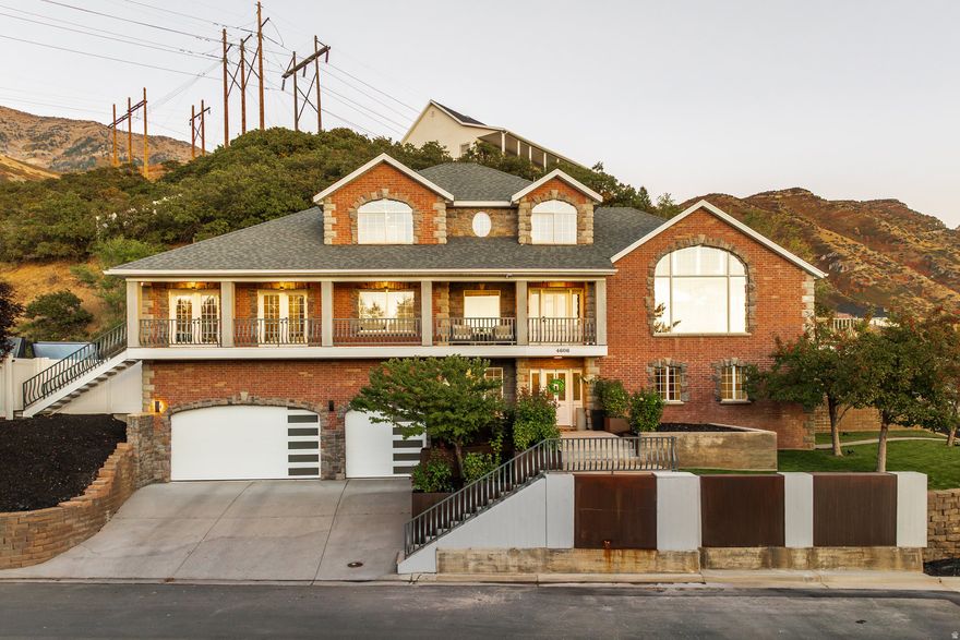 ***Temporary Rate Buydown Available on this property with Preferred Lender*** Please call listing agent for details. Set in Provo's highly desirable east bench, this fully reimagined residence blends timeless modern design, vaulted ceilings, and panoramic views of Utah Lake, the Wasatch mountains, and unforgettable Provo sunsets. Complete transformation  everything is new: custom kitchen, spa-inspired baths, roof, closets, doors, landscaping, sprinkler system, and garage doors. Owner's sanctuary  expansive master retreat with whirlpool tub, dazzling snow-white luminescent tile, and a striking concrete shower. Soaring interiors  vaulted ceilings and fresh designer paint create light, elegance, and openness throughout. Smart luxury  state-of-the-art, app-enabled appliances (including touchscreen refrigerator), new AC/furnace with humidity control, whole-home soft water system, solar shades, and UV-tinted windows. Resort amenities  an incredible swim spa that heats to 104 or cools quickly, adding only about $50/month in utilities and requiring minimal maintenance for year-round enjoyment. Rare outdoor experience  ascend the "stairway to heaven" pergola for panoramic sunsets, fireworks, and al fresco dining with boundless views. Garage excellence  oversized 3-car garage with high ceilings, epoxy floors, premium storage racks, and all-new doors-ideal for large vehicles, storage lifts, or workshop space. Truly move-in ready  includes washer, dryer, and brand-new TV for immediate comfort. Premier location  near top-rated schools, Riverwoods shopping, and fine dining, in a community known for its prestige. This is more than a remodel-it's a complete reinvention of a home, crafted to be a forever residence where luxury, efficiency, and breathtaking views converge. Call today for a private showing!