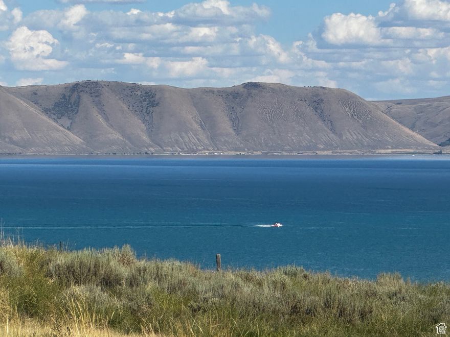 Incredible Bear Lake and mountain view fro this Terrace Patio lot in The Reserve at Bear Lake.  Year round access, all utilities stubbed, gated, paved roads, STR ALLOWED!  Walk to The Reserve clubhouse with fitness room, two pools, hot tub, splash pad, sports court...plus includes playground and GATED BEACH ACCESS! Fish Haven Canyon access for ATV/UTV, snowmobiling, snowshoeing, hiking and mountain biking.  Bear Lake State Park Marina 10 min; Beaver Mountain Ski Resort 25 min.  Build your vacation property or private residence.