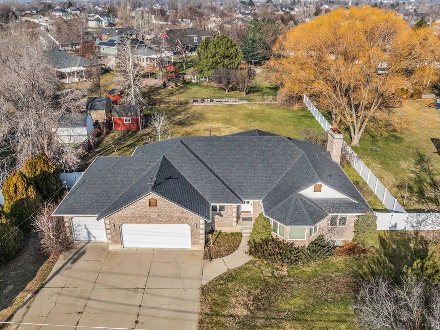 Opportunity in a desirable Kaysville neighborhood. This spacious 1993-built home sits on a rare half-acre horse property and is vacant, cleaned out, and structurally sound - ready for a cosmetic transformation. The layout is generous and functional, featuring large living spaces, ample bedrooms, and a basement workshop with a separate entrance from the 3-car garage. While dated, the home will benefit primarily from updated flooring, lighting, paint, and countertops, making the scope of work straightforward. The half-acre lot offers space, privacy, and horse property designation, with nearby high-value homes reinforcing the upside. A compelling value-add opportunity at a conservative price. Come see how you would make it yours!