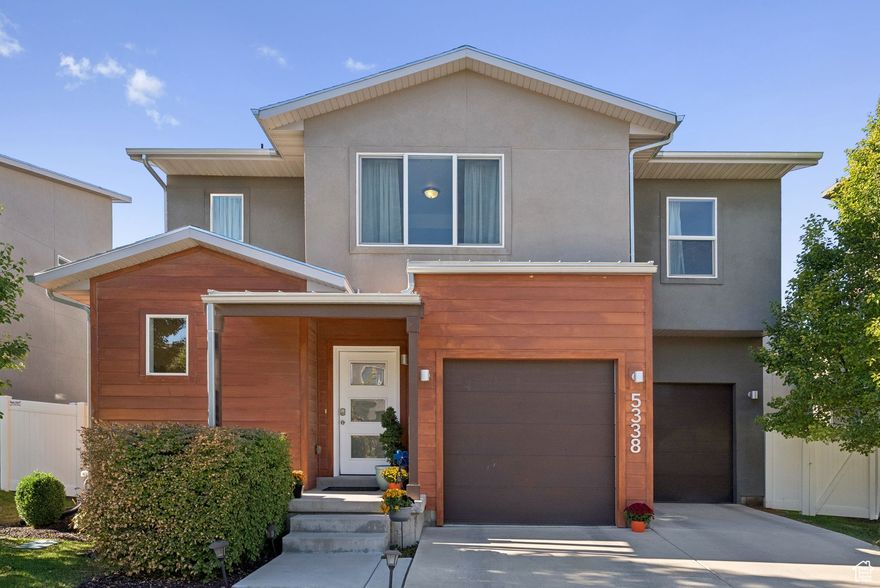 Welcome to this beautifully maintained, one-owner contemporary home in Herriman Town Center. Featuring an open layout with a warm, natural palette, the home boasts a stylish kitchen with shaker cabinets, granite countertops, stainless steel appliances, a spacious island with bar seating, and a pantry. The generous primary suite offers a private bath and walk-in closet, while the fully fenced backyard with a concrete patio is perfect for relaxing or entertaining. Complete with a two-car garage, full landscaping with sprinklers, and a prime location near Mountain View Corridor, Mountain View Village, and Bangerter Highway, this home has it all.  All information provided as a courtesy. Buyer to verify all.