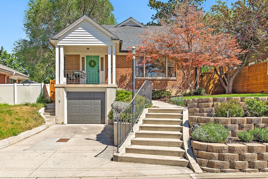 Storybook bungalow in coveted 15th & 15th, one of Salt Lake's most desirable neighborhoods, completely remodeled from top to bottom, every permit pulled. Situated between the University of Utah and Westminster College, with easy access to downtown and the McClelland Trail just to the north. All-new electrical, plumbing & HVAC with custom-bent ductwork designed to preserve precious ceiling height. The chef's kitchen is anchored by a professional Wolf range, marble countertops & stunning intricate marble floors. Original French doors open to the living space where an antique quarter-sawn white oak mantel with period custom tile sets the tone. Original hardwood floors throughout the main level, no carpet anywhere. Every bathroom is finished with intricate marble floors & marble countertops. Custom leaded glass pane in the upstairs bath, tankless water heater, custom window wells with egress windows for safety and light. New fence. Outside, an extraordinary $60K paver entertaining space with retaining wall flows into a large lush grassy backyard, all framed by a terraced front yard with a new sprinkler system. New storage shed. The lower level includes an additional living area with a kitchen sink, separate living room, two bedrooms, and a full bath, with garage access and a side entrance. This is a rare, turnkey bungalow where the character was preserved and everything else was done right. Nothing left to do but move in. Square footage figures are provided as a courtesy estimate; buyers are advised to verify all information independently.