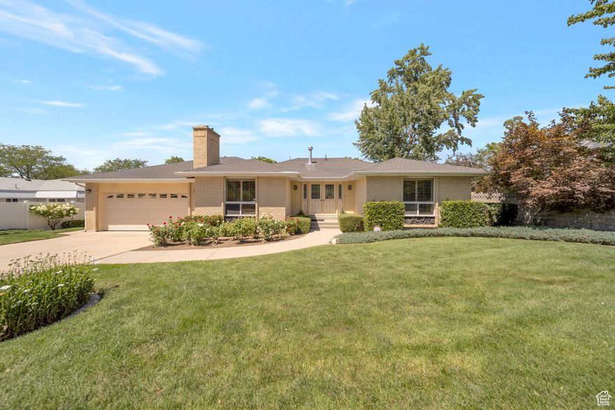 Beautiful white brick rambler located in desirable Cottonwood Heights Neighborhood. Meticulously maintained inside and out! Great floorplan offers family, formal and entertaining area's. Featuring living room with high sweeping ceilings, 4 bedrooms, 3.5 bathrooms, 2 fireplaces, main floor laundry and family room off of kitchen plus 2 additional family room spaces down(one with a kitchen size wet bar). Basement entrance would make for perfect mother-in-law apt set up.  Primary suite and kitchen both walkout to a covered deck that drops down to a private covered patio area surrounded by immaculate yard with full fence, fountain and storage shed. Many upgrades such as new water heater, newer roof, upgraded flooring and more. So clean and well taken care of that you can move right in and begin to enjoy all this home has to offer along with the convenient location that puts you close to everything.  Don't miss this home!