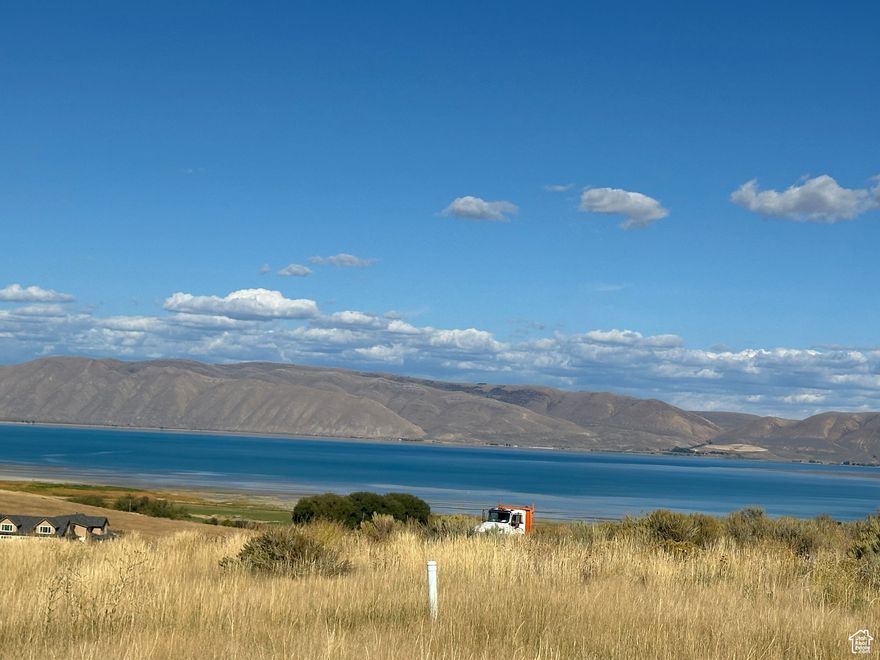 Great building lot in The Reserve at Bear Lake. Great location---close to clubhouse, heated pools (seasonal), hot tub (year round), splash pad, sports court, playground and gated beach access. Paved roads, all utilities stubbed, Access to Fish Haven Canyon for ATV/UTV, snowmobiling, snowshoeing, hiking, mountain biking. Bear Lake State Park Marina 10 min, Beaver Mountain Ski Resort 25 min. Short term rentals allowed.