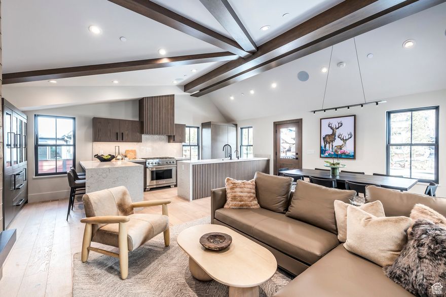 Nestled in the heart of Park City, this stunning new construction home seamlessly combines modern luxury with a nod to the area's rich history. The highlight of this property is its fully restored historic cabin from the early 1900s, a testament to Park City's silver mining days. Step inside to discover an inviting open floorplan, perfect for both intimate gatherings and grand entertaining. The chef's kitchen is a culinary masterpiece, featuring top-of-the-line appliances and an abundance of counter space. The adjoining great room is the ideal spot to unwind and relax by the fireplace. Upstairs, the private primary suite awaits, offering a tranquil retreat with breathtaking mountain views. Two additional bedroom suites and a bunk room on the lower level provide ample space for family and guests. It also boasts a comfortable family room with a wet bar and beverage drawers to fulfill your entertainment needs. Outside, a private deck beckons you to unwind in the hot tub, surrounded by the natural beauty of Park City. This home is being offered fully furnished, including curated art and decor, for a truly turnkey experience. Designed by the renowned Jonathan DeGray, built by Aerie Construction, and featuring interior design and furnishings by Jo Ann Howa with Natural Instincts, no detail has been overlooked in the creation of this exceptional home. 741 Rossie Hill is a part of the Lilac Hill neighborhood and is steps from the free Park City bus stop that can whisk you to the base of Main Street or Deer Valley's Snow Park Lodge in under 5 minutes! Don't miss your chance to own a piece of Park City's history and make this extraordinary property your own. Contact us today to schedule a private tour!