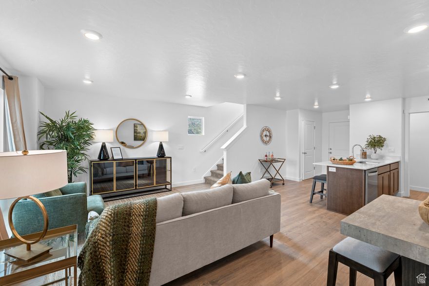 NEW SELLER FINANCING INCENTIVE AVAILABLE with big savings! Location, location, location-- this community, ideally located in the hills of Lehi only 5 mins from I-15, is truly hard to beat! You'll enjoy majestic views of Lone Peak, Timpanogos, Utah Lake and the valley. Not to mention the announced Lehi temple nearby. This home is right near our massive clubhouse and pool area as well! Inside the home you'll comfortably enjoy an open concept main level with stylish kitchen, powder room, and living space. Upstairs you'll find 3 nice bedrooms, walk-in laundry room, and 2 bathrooms. Kitchen includes modern shaker cabinets, quartz counters, and stainless-steel appliances with gas range! Bought down rate and $4,000 towards closing costs using our preferred lender. Actual home may differ in color/material/options. Pictures are of finished homes of the same floor plan and may contain options/upgrades/ decorations/ furnishings not available at the advertised price. No representation or warranties are made regarding school districts and assignments; conduct your own investigation regarding current/future school boundaries. Buyer to verify all information.