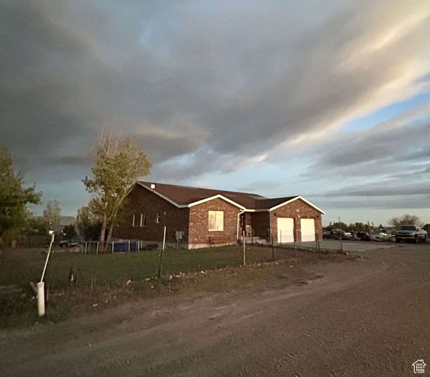 So much potential with this Fixer Upper!! This spacious home has 6 bedrooms, 3 bathrooms with just over 4,200 sq ft. Located on a dead end road with Beautiful views of Split Mountain and open pasture to the south/west. Master bedroom and 2 bedrooms are located on the main level. Great room is oversized with open concept to the dining and living area. Deck off of the Main level is perfect for outdoor enjoyment.  Square footage figures are provided as a courtesy estimate only. Buyer is advised to obtain an independent measurement.