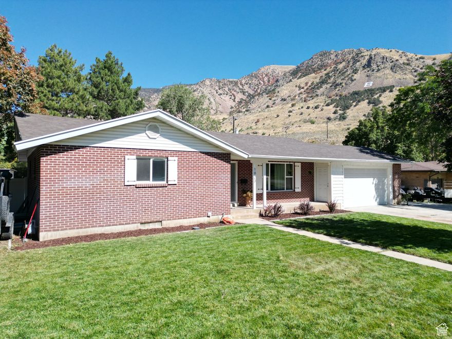 This is the home that you have been waiting for!   This home sits on a quiet tree lined street and has had too many updates and renovations to list!  There is new carpet and paint as well as updated everything else!   This home has a large gathering room and a total of 5 bedrooms.   The basement has two large gathering areas and tons of storage.   Outside you will find a completely fenced yard with a very nice fire pit area that is perfect for hanging out.   There is a large storage area, but the extra bonus is a 30 x 35 massive workshop with tons of overhead storage and enough room to tackle or take care of any of project that you might have!   Make your appointment to see this home today!