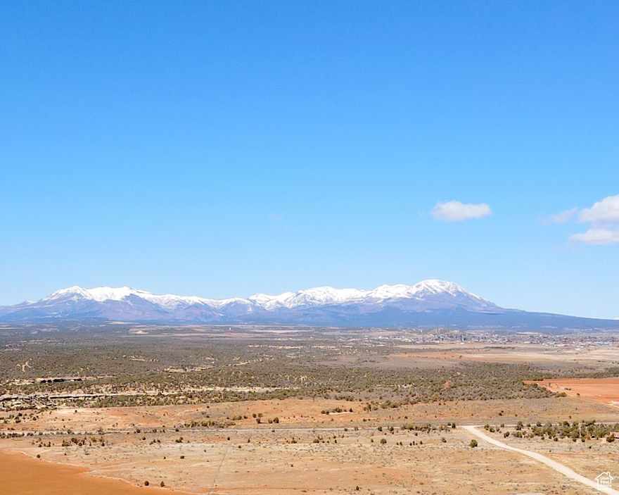 This captivating 6-acre parcel presents picture-perfect views of the Abajo Mountain, Bears Ears, Sleeping Ute, and beyond. This idyllic property boasts ample space for your dream home, a garage, barns, and room to roam for both your family and beloved animals. A road to a potential building site has been roughed in, laying the foundation for your future sanctuary. Practicality meets convenience with a 1500-gallon septic tank already installed. Culinary water sourced from shared wells, provides an essential resources for comfortable living. Yearning for even more space and privacy? The adjoining 6-acre lot is also available, offering an opportunity to expand your domain and create the ultimate retreat from the hustle and bustle of everyday life. Seize the opportunity to make your dreams a reality today! Buyer to verify all information.
