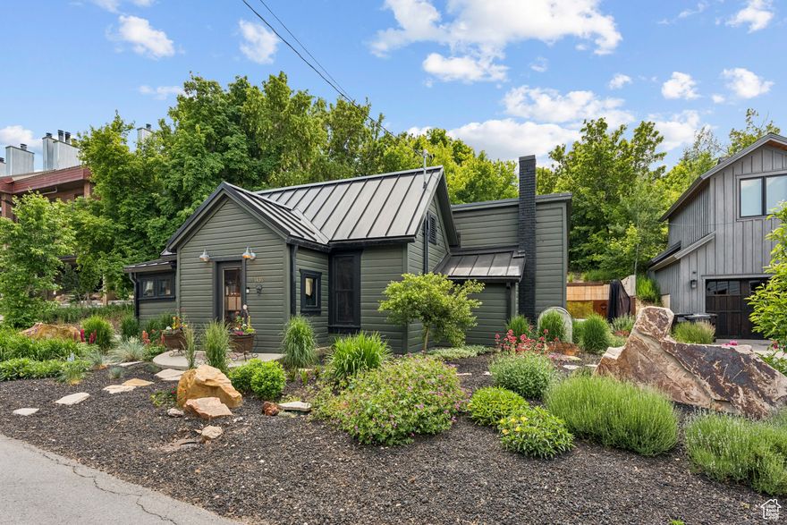 Step into a piece of Park City history with this artist's residence built in 1905 that perfectly blends old-world charm with modern comfort. Known locally as ''The Safe House,'' this completely updated historic gem showcases unique design elements that make it truly one-of-a-kind in Park City. The home's charming exterior immediately catches the eye, reflecting the creative spirit that flows throughout the property. Inside, you'll discover thoughtfully updated spaces that honor the home's century-old character while providing all the modern amenities you need.