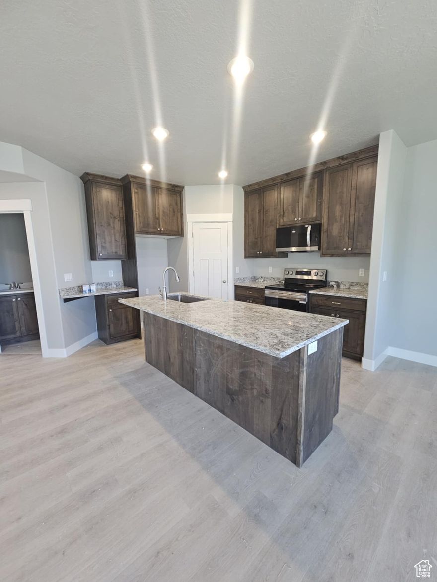 Custom Built 2 story Twin home! This beautiful custom built home offers vaulted ceilings, granite counters, upgraded cabinetry with island package, stainless steel appliance package large windows & upgraded hard surface flooring throughout the main floor. The master bath is stunning! Walking distance to local shopping, park trails, and close to freeway access. Photos are not of actual home but of a similar townhome built by the builder & are provided to show the builders work. Photos will be updated during construction process. Multiple Twin homes & single family available. Call agent for more info. Buyer/Agent to verify all information.