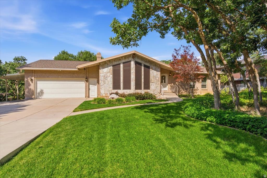 Photo of 2465 E WOODLAND DR, Ogden, UT 84403 (MLS # 2172471)