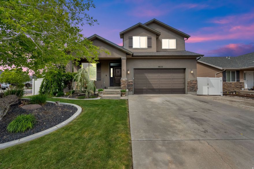 Hard-to-find Herriman home with a private, park-like backyard that truly sets it apart.  This updated two-story offers 3 bedrooms, 2.5 bathrooms with functional living space. The main areas have been recently remodeled, featuring a refreshed kitchen and living room with a bright, open layout designed for both everyday living and entertaining.  Upstairs includes spacious bedrooms and a versatile layout that easily accommodates families, guests, or a home office.  Step outside and you'll immediately notice the difference. The fully fenced backyard is lush, mature, and thoughtfully landscaped, creating a peaceful retreat that's rare to find. Enjoy the tranquil water feature, established trees, and shaded outdoor living space with a covered patio and pergola, perfect for relaxing or hosting.  Additional highlights include strong curb appeal and move-in-ready condition throughout.  Located in an HOA community with access to a clubhouse and pool, and close to parks, trails, and everyday amenities.