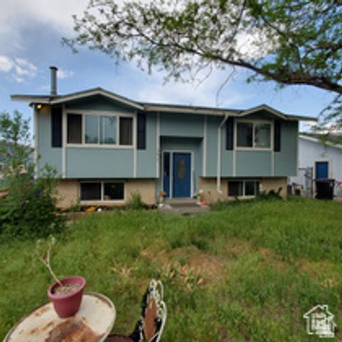 Photo of 5615 S HONEYSUCKLE WAY, Salt Lake City, UT 84118 (MLS # 2124790)