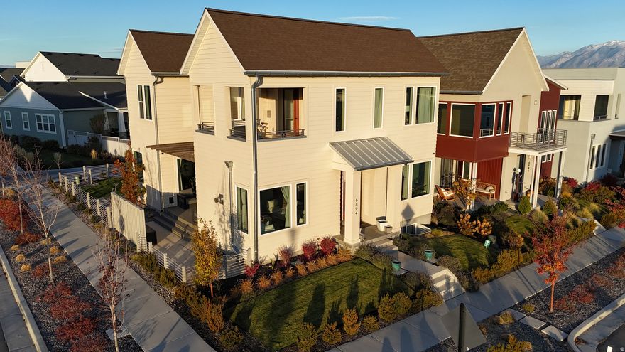 Seller Financing Available! Rare and Coveted Sego Adventurer Floor Plan. This exceptional home showcases a one-of-a-kind design with 10-foot ceilings on the main level and 9-foot ceilings on both the upper level and basement, creating an open and spacious feel throughout its 3,875 square feet of thoughtfully crafted living space. The primary suite offers a luxurious retreat with an oversized, covered, hot tubready patio and unobstructed, breathtaking views. Expansive windows flood the home with natural light, while large sliding doors seamlessly connect the main living area to the main level patio , creating effortless indoor-outdoor living. The yard is fully fenced with a privacy fence, ideal for comfort and seclusion. This is one of the last Sego Adventurer models featuring custom slab-door cabinetry throughout-showcasing both style and craftsmanship. Every corner of this home combines modern functionality with refined luxury, making it truly one of a kind.