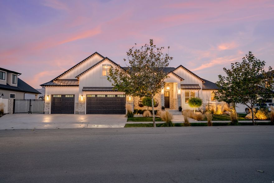 Nestled on a horseshoe-style street, this luxury, west-facing home sits in a highly desirable area and features 6 bedrooms, 5 bathrooms, and a 4-car garage with epoxy flooring and additional storage space and cabinets. It also includes Jellyfish exterior lighting for year-round and holiday displays. Built by one of Utah's premier builders, JCraft Homes, previously showcased in the Parade of Homes on this very street, it also comes with the benefit of no HOA. Designed for elevated living, the open-concept main level features vaulted ceilings, an upgraded kitchen, and an oversized pantry, with seamless flow between the dining and living areas for both entertaining and comfortable everyday living.  Storage is abundant throughout: custom garage cabinetry, ceiling-mounted garage storage, a large basement storage room, and an exterior shed. The custom primary bedroom closet is a standout, blending luxury and functionality. The oversized lower level offers exceptional versatility with a second full kitchen, a pebble ice maker, and a large entertaining area, an ideal setup for guests or gatherings. The flat backyard is designed for relaxation and fun, featuring evening landscape lighting, a string-lit wood pergola with electrical conduit for lighting, an in-ground trampoline, a basketball court, and a hot tub. The oversized RV pad provides excellent flexibility and can extend up to approximately 89 feet if the movable shed is relocated. With solar panels offering energy efficiency and long-term savings, this home combines luxury, comfort, and thoughtful design. The location is exceptional, just 4 minutes to Bangerter Hwy, under 10 minutes to I-15, 10 minutes to Costco, and 8 minutes to Mountain View Village for shopping, dining, and entertainment, and near horse and walking trails along the canal.