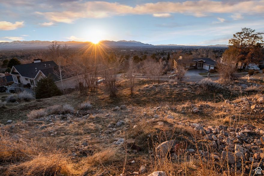 Here's your opportunity to build your dream home in highly sought after neighborhood in Holladay!  Surrounded by high end homes, this lot offers spectacular Mountain and Valley views!  Enjoying Beautiful Sunsets is forever in your future!