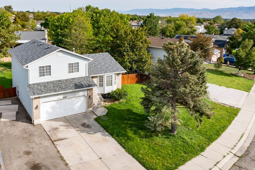 Seller will provide a one point interest rate buy down for one year and a $500 appraisal credit using our preferred lender. This beautifully updated West Jordan home is truly move-in ready! Step inside through the new front door and enjoy this delightful remodel. Here's the lineup - new kitchen with quartz counters, faucet, disposal, appliances including fridge, soft close cabinets, lighting and tile flooring. New bathroom vanity's, faucets, tile flooring, toilet and surround. New carpet, tile entry and new paint throughout. New outlets, light fixtures, ceiling fan, smoke detectors, door stops and stained railing. While they were at it they also installed new shingles on the roof, gutters and a new furnace with central air. Don't miss this one!