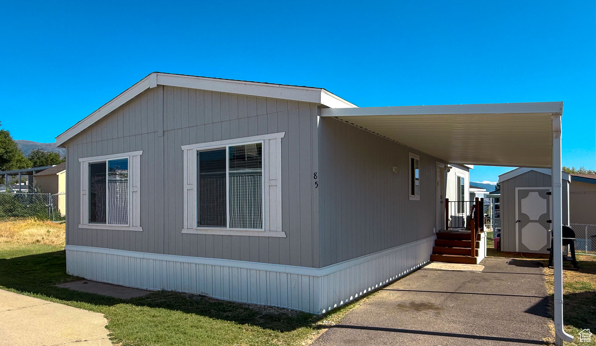 2023 model BROADMORE. This double-wide with two bedrooms, two baths, a large living room, stainless steel appliances, and a walk-in closet is located in the Rolling Hills Community in Layton. Owners have access to a pool, clubhouse, playground, common RV parking, and more. Buyers must qualify with the park; no land is included with the sale.