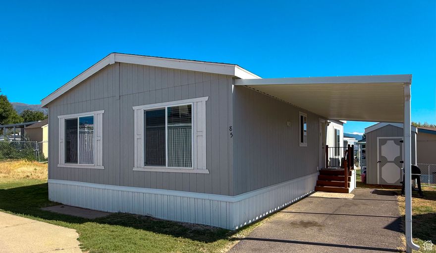 2023 model BROADMORE. This double-wide with two bedrooms, two baths, a large living room, stainless steel appliances, and a walk-in closet is located in the Rolling Hills Community in Layton. Owners have access to a pool, clubhouse, playground, common RV parking, and more. Buyers must qualify with the park; no land is included with the sale.