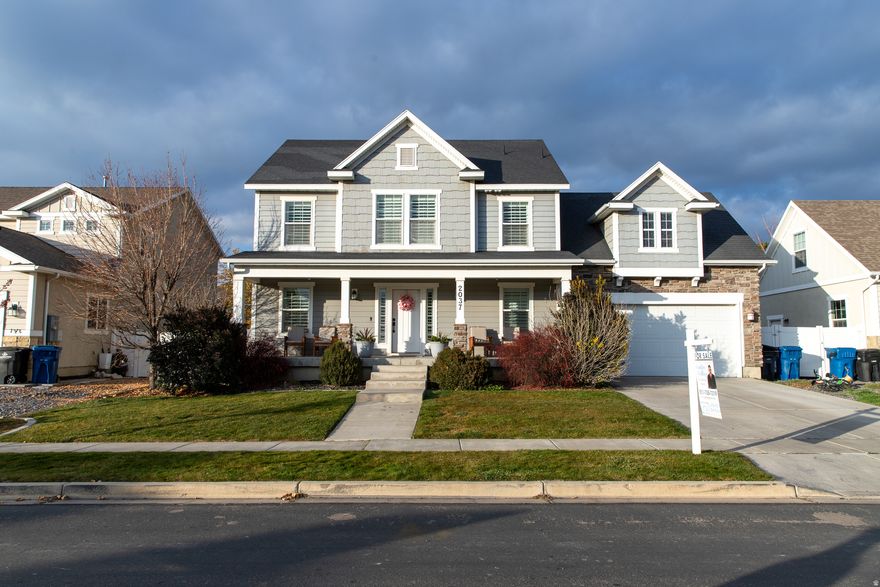 Come see this beautiful two story home with plenty of upgrades priced to sell!!  Located in a wonderful neighborhood located with a dead end street to keep it quiet and serene.  Still close to shopping, restraunts and a golf course.  Enjoy beautiful mountain views all around you.  Entertain guests in the fully fenced backyard or watch football in the large basement living room equiped with a kitchenette.  Come see the sleek designs which include board and batten in the main living area.  Start 2026 in your new beautful home.Buyers to verify all information. Square footage is from county records.