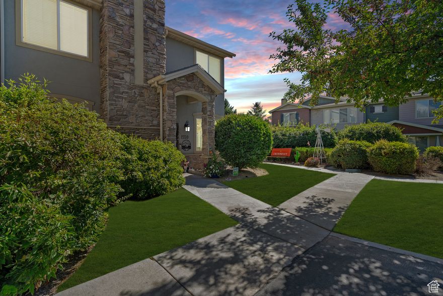 Don't miss your chance to own this highly sought-after, rarely available main-floor unit - perfect for easy, stair-free living! This community is excellent and offers a clubhouse with a spa, gym, and pool.  In addition, the fee includes paying for your city utilities.  Enjoy soaring 9-foot ceilings, large, bright windows, and brand-new laminate flooring throughout. The open-concept kitchen and family room make entertaining a breeze, while each bedroom boasts a walk-in closet, offering plenty of storage.  Love your hobbies or need extra space? The oversized garage (approx. 525 sq ft) has room for all your toys and tools. Step outside to your covered patio, ideal for barbecuing or simply relaxing while enjoying your private view.  This one won't last long - schedule your showing today!