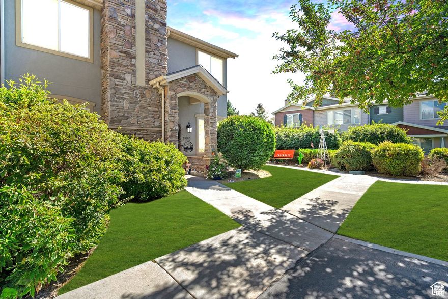 PRICE IMPROVEMENT!!  Don't miss your chance to own this highly sought-after, rarely available main-floor unit - perfect for easy, stair-free living! This community is excellent and offers a clubhouse with a spa, gym, and pool.  In addition, the fee includes paying for your city utilities.  Enjoy soaring 9-foot ceilings, large, bright windows, and brand-new laminate flooring throughout. The open-concept kitchen and family room make entertaining a breeze, while each bedroom boasts a walk-in closet, offering plenty of storage.  Love your hobbies or need extra space? The oversized garage (approx. 525 sq ft) has room for all your toys and tools. Step outside to your covered patio, ideal for barbecuing or simply relaxing while enjoying your private view.  This one won't last long - schedule your showing today!