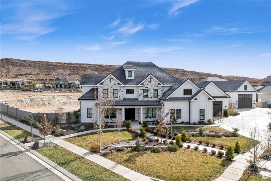Own this stunning custom estate in Little Valley! Home is on .92 acres*Massive 2-story SHOP! Gourmet kitchen*Double dishwashers*Warming drawer*Media Room*3 Kitchens*Playroom w/custom Tree House w/Slide & Built-in climbing wall*Speakers*Craft room*Pre-wired  for Elevator*715K price reduction! There is no shortage of garage space in this home*With tall doors you can get your boat in the attached garages w/tower up! Plenty of space for an RV & man-cave*Over 3700 SF of total garage space*Super Economical Dixie Power!*Wired for a Generator*2x50 amp outlets*2 RV dump stations*RARE OPPORTUNITY to own a total of 1.72 ACRES w/purchase of Meadow Valley LOT #92 - MLS #24-256739