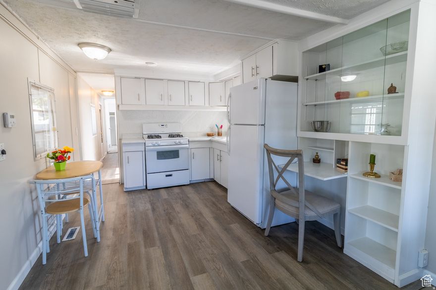 Welcome to this charming updated 2-bedroom, 1-bath mobile home located in a small, well-maintained mobile home park offering peace and privacy. This home features a spacious carport, two handy storage sheds, and an extra-large front porch with an awning-perfect for relaxing or entertaining. Step inside to discover brand-new countertops and flooring throughout, giving the home a fresh and modern feel. The front room boasts push-out windows, expanding your living space and filling the room with natural light. Both bedrooms offer generous closet space, with the second bedroom highlighted by a stunning double glass door entry-ideal for a guest room, office, or creative space. The bathroom also includes a large storage closet, making organization a breeze. CALL PARK MANAGEMENT FOR RULES AND LOT RENT! Square Footage provided as a courtesy - buyer to confirm square footage. We can help guide financing! Please note this home has lot rent and rules. Please contact the community management and NOT the listing agent or owner directly for this information. Home can not be moved. ALL MOBILE HOMES SOLD AS IS! Seller financing available - ask for details.