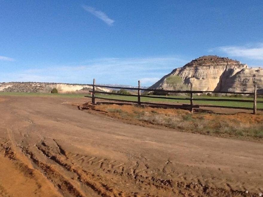 This unique property has 2 shares of Class A Boulder Irrigation Company included. The well has already been dug and has deeded private road access. Septic been approved with pump in casing but not installed. Views of The Grand Staircase National monument and views of the sandstone mesas.