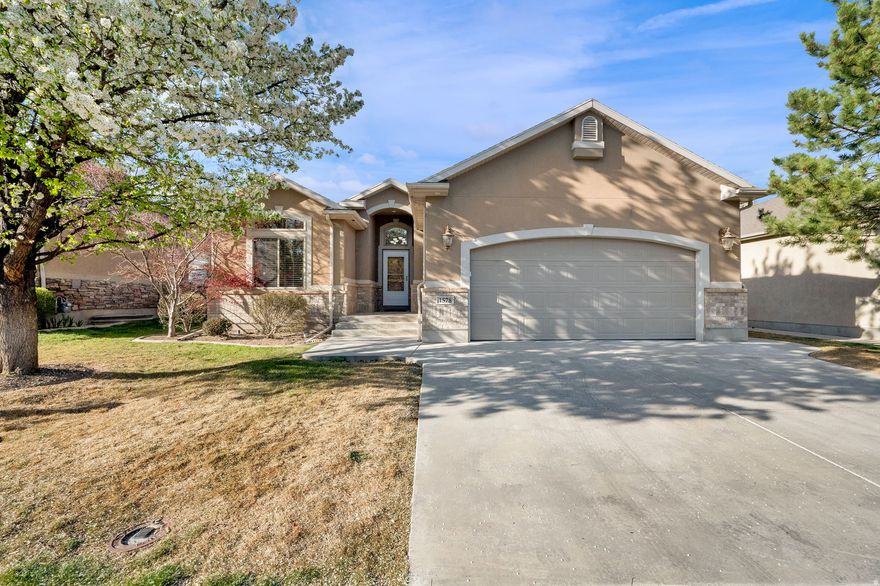 **Grand Open House~ Saturday, March 28, 12-2 pm** Step into refined, low-maintenance living in this beautifully updated home within a sought-after gated community. Fresh paint and brand-new carpet create a bright, inviting interior, while the open main-floor layout offers both comfort and ease. The spacious kitchen features solid surface countertops, a gas range, ample prep space, and a walk-in pantry, flowing seamlessly into the dining area and welcoming family room with a cozy fireplace. The main-level primary suite provides a private retreat with a soaking tub, separate shower, and large walk-in closet. Upstairs, a dedicated office with built-ins offers the perfect space for work or quiet focus. The fully finished lower level, with its own private entrance, offers excellent potential as a mother-in-law apartment. It expands your living space with a large family room, second fireplace, wet bar with fridge, bonus area, two bedrooms, full bath, and abundant storage. Enjoy outdoor living on the covered patio with gas BBQ hookup, overlooking a private, fenced yard with mature trees. Community amenities include a clubhouse, exercise room, pool, and hot tub-offering a lifestyle of comfort, convenience, and connection. Owner/agent