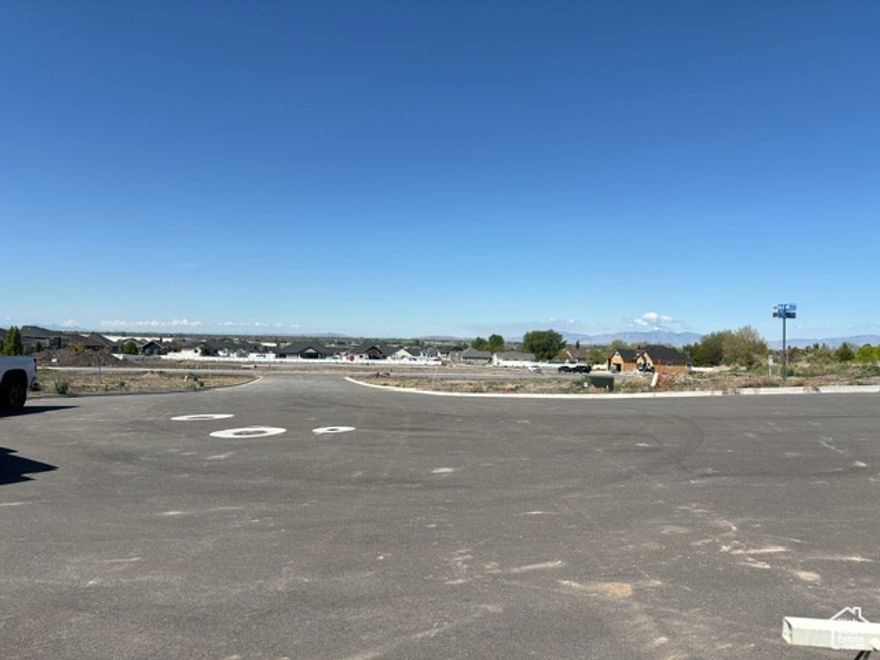 Build your custom dream home with our exclusive homebuilder. Rocky Meadows Phase 2 is a coveted subdivision in Pleasant View. With gorgeous views of the mountains to the east and of the valley to the west. It's a fully improved lot, with culinary water, secondary water, sewer, gas, power and High-Speed Internet stubbed to the lot line and ready to build on. Don't wait give me a call today! *THIS LOT IS NOT AN EXCLUSIVE LOT - BRING YOUR OWN BUILDER