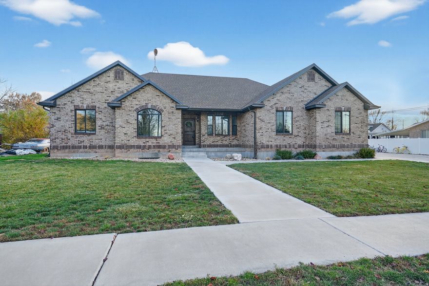 This beautifully remodeled 7-bedroom rambler home with a 3 car garage & RV Parking offers spacious living on a rare half-acre lot that comes with one water share, in a quiet established neighborhood. Thoughtfully updated throughout, the home blends modern comfort with timeless charm, providing plenty of room for entertaining, multigenerational living, or future flexibility. Enjoy the privacy and space of the large yard while still being just minutes from nearby parks and schools-an ideal setting for convenience, comfort, and community.