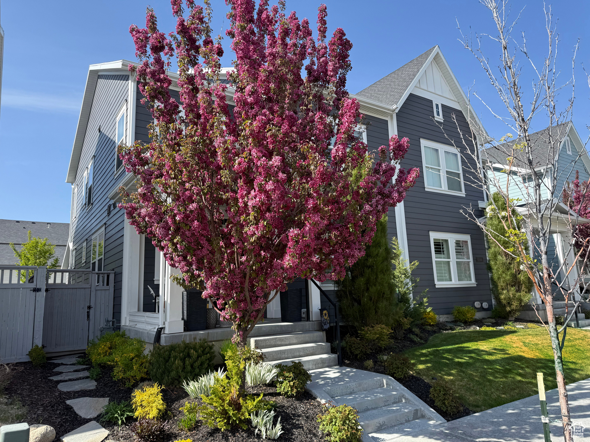 This stunning twin home in the heart of Daybreak shows better than a model, offering the perfect blend of luxury, comfort, and convenience. Thoughtfully upgraded throughout, it features designer finishes, high-end fixtures, and a flowing open-concept layout that makes every space feel intentional and refined. The private, fully fenced yard creates a peaceful retreat just steps from shopping, dining, and the brand-new Bee's baseball stadium. With every upgrade imaginable and impeccable attention to detail, this home is truly a rare find in one of Daybreak's most vibrant and walkable locations. This property also includes access to all of the Daybreak amenities with one of the lowest monthly HOA payments.