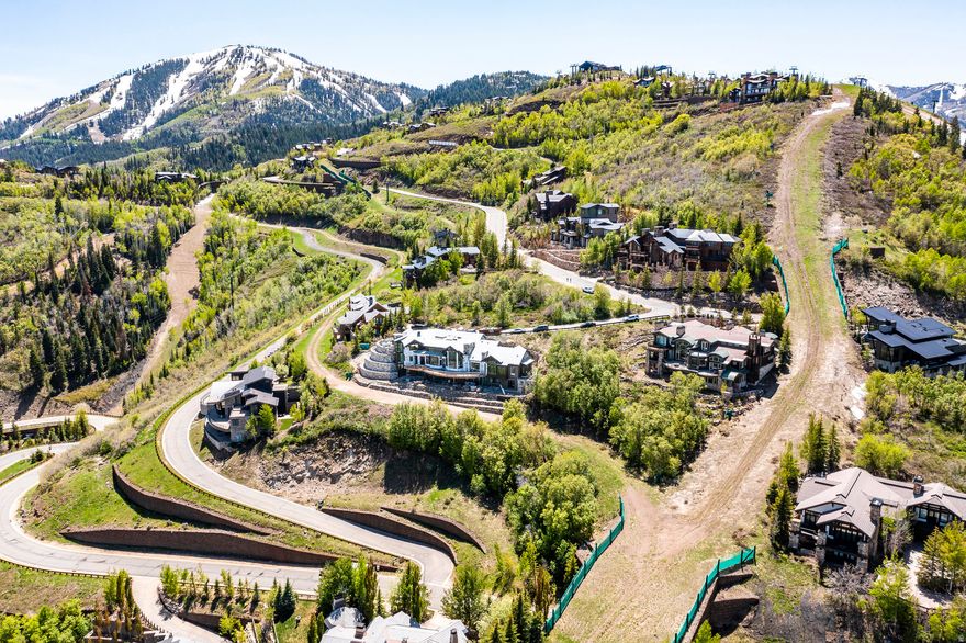 Nestled in the exclusive gated community of Deer Crest, this stunning Ski-in/Ski-out vacant lot offers direct access to Deer Valley's world-renowned trails. Build your dream ski chalet and enjoy breathtaking eastern views stretching across the Jordanelle Reservoir to the majestic Uinta Mountains. Perfectly situated, this property is just a short drive to the new Deer Valley East Village, Park City's Historic Main Street, charming Midway, and Salt Lake City. This rare opportunity combines unmatched natural beauty with ultimate convenience, making it the ideal mountain retreat.