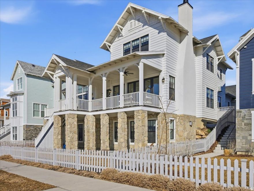 Magnificent lakefront masterpiece on Daybreak Island captures spectacular lake and mountain views. Wow! Gorgeous designer furniture and decor included in sale. Exciting opportunity to move right in and celebrate the holidays! Stunning great room features  Italian tile fireplace and exposed beams. Exquisite gourmet kitchen is a culinary showcase. Viking appliances, premium quartz surfaces, and paneled wall butler's pantry. Luxurious main-level primary suite is a serene sanctuary with mesmerizing lake views, spa-inspired bath and custom walk-in closet. Three additional en-suites include private baths.  Incredible walk-out lower level is perfect for lavish entertaining and ready to add full second kitchen and home theater.  Fabulous, outdoor living spaces embrace lakefront living and hosting gatherings.  Impressive, heated three car garage with epoxy flooring. The Island at Daybreak offers a luxury lifestyle. Pavilions, sandy beaches, firepits, and paved walkway around the lake. Residents enjoy complimentary kayaks, canoes and paddle boards. Minutes to Downtown Daybreak restaurants, concerts, new megaplex entertainment complex and Salt Lake Bees stadium.  Truly an extraordinary residence on Daybreak Island. 11064PaddleBoardWay.com