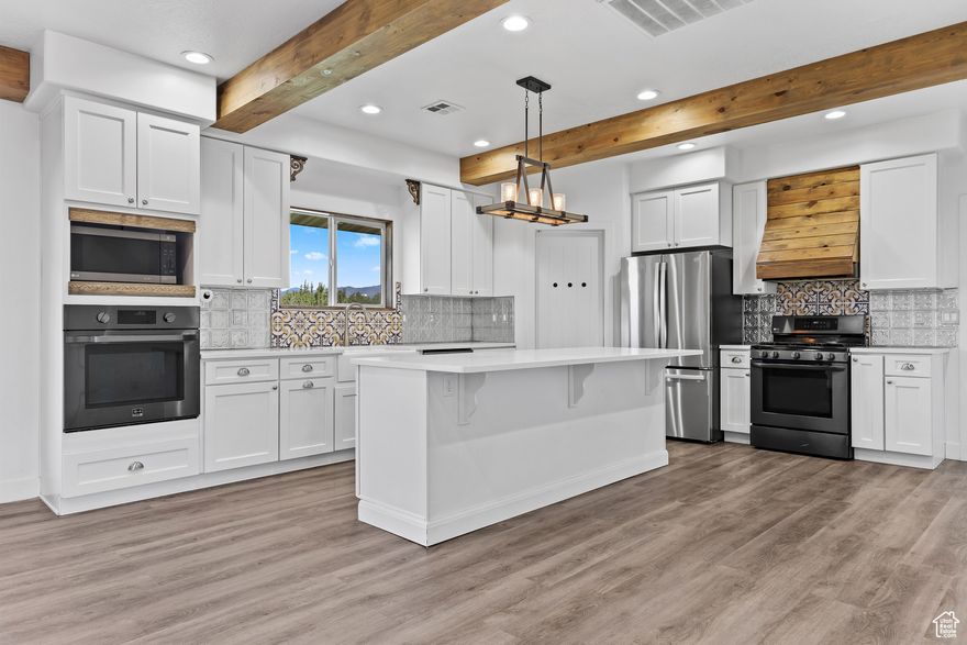 Enjoy peaceful country living on 5 acres in scenic New Harmony, Utah. This 3,187 sq ft custom home offers 6 bedrooms, 3 bathrooms, and a thoughtfully designed layout with modern upgrades throughout. The kitchen features quartz countertops, double ovens, gas range, farmhouse sink, and a huge walk-in pantry with quick garage access. Cozy up by the wood-burning fireplace and enjoy year-round comfort with dual heating and cooling systems.The main level includes a spacious dining area, mud bench, and a flexible laundry room. Upstairs, a roomy loft offers breathtaking mountain views and a separate thermostat for added comfort. Outside, you'll love the wraparound porch, oversized concrete driveway, and dedicated areas for animals-the orchard, pasture, and chicken coop are all fenced, making this property ideal for a small hobby farm. Zoned for Washington County schools with the option to attend any school in the district-or hop on the bus route to Cedar City schools. Conveniently located between St. George and Cedar City with quick I-15 access, this property offers a rare mix of space, scenery, and self-sufficiency.