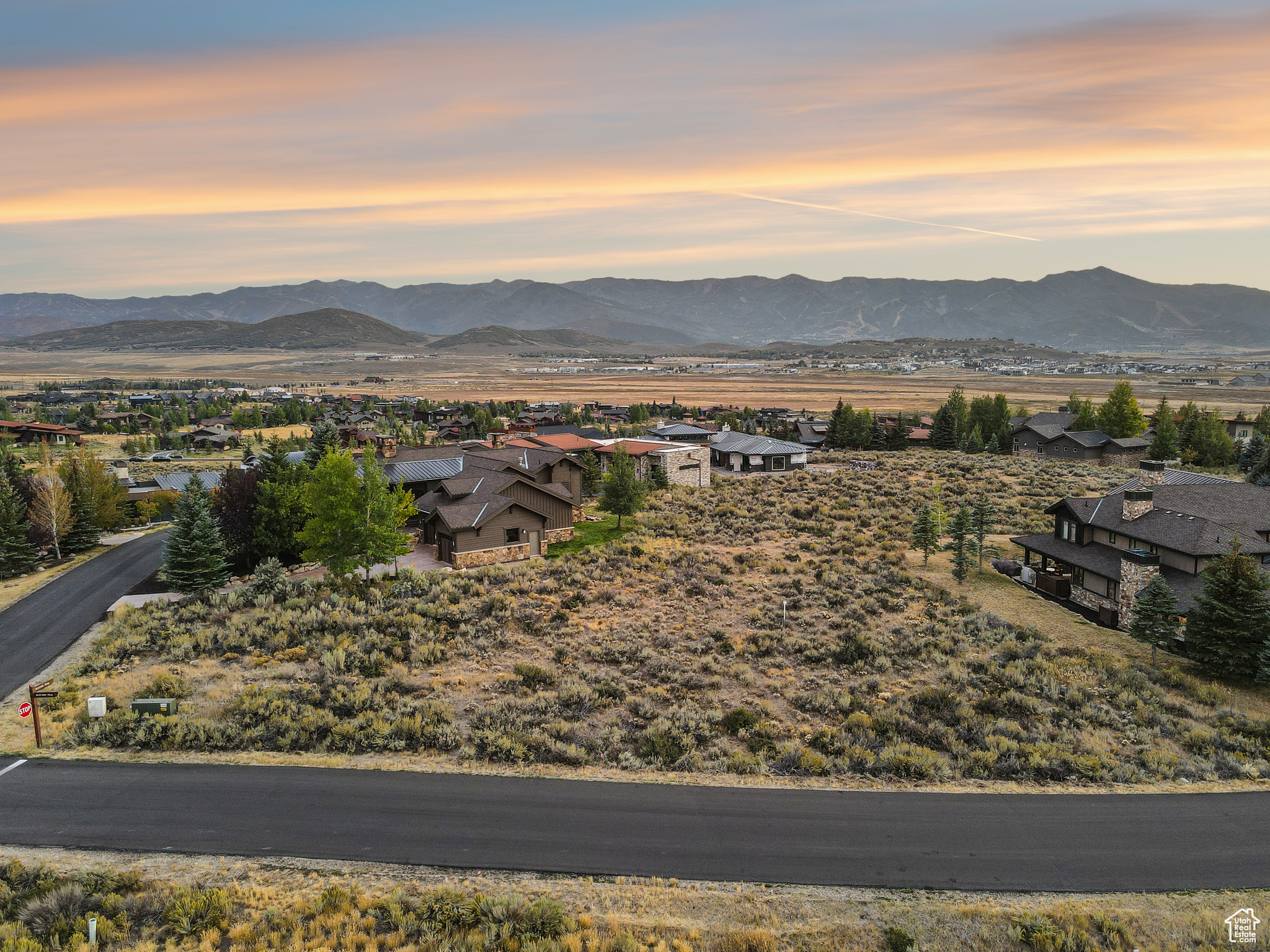 Discover an exceptional opportunity to build your dream mountain home on Lot 36 in The Homesteads at Promontory. This 0.44-acre homesite offers an ideal northeast frontage with southwest-facing views, perfectly positioned to capture Park City's legendary sunsets. Nestled within the exclusive Promontory Club, this lot provides privacy while keeping you close to world-class amenities, including two championship golf courses, nine clubhouses, equestrian facilities, hiking and biking trails, and year-round family activities. Just minutes from Park City's historic Main Street and only 45 minutes to Salt Lake City International Airport, Promontory combines luxury mountain living with unmatched convenience.